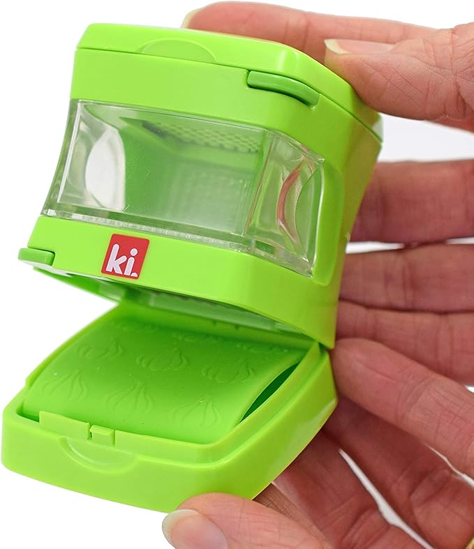Garlic-A-Peel Garlic Press, Crusher, Cutter, Mincer, and Storage Container - Includes Silicone Garlic Peeler - Easy to Clean - Stainless Steel Blades – (Green), standard