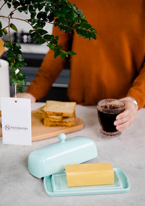 Nucookery Ceramic Butter Dish with Lid | Raised Legs and Non-Slip Strip Design | Porcelain Health | Dishwasher Safe, Lake Blue