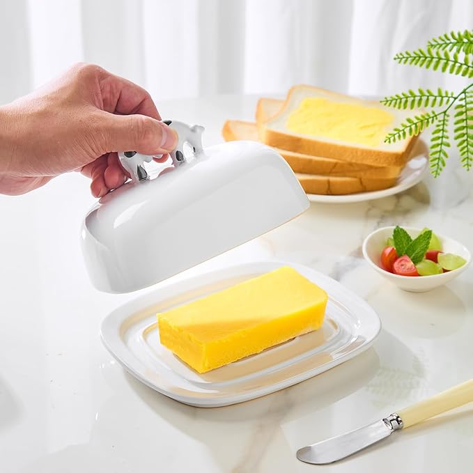 Butter Dish with Lid for Countertop, 7.8" x 6.3" Large Ceramic Butter Keeper Container with Cow Handle, White Butter Holder Tray for East West Coast Butter Stick, Microwave & Dishwasher Safe