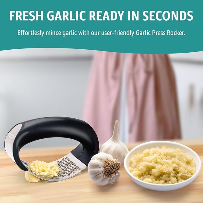 GD Garlic press rocker, crusher, mincer tool stainless steel with a Garlic Peeler, spatula, and Brush extract more Garlic Paste. The Garlic Mincer Tool Squeezes, Extracts, Crushes