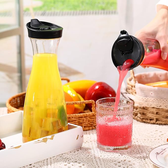 Xinnun 12 Pcs Water Carafe with Flip Top Lid Plastic Carafe with Black Lid Clear Plastic Water or Juice Beverage Pitcher Beverage Pitcher Jug for Restaurant Party School Bar Juice Milk Coffee (20 oz)