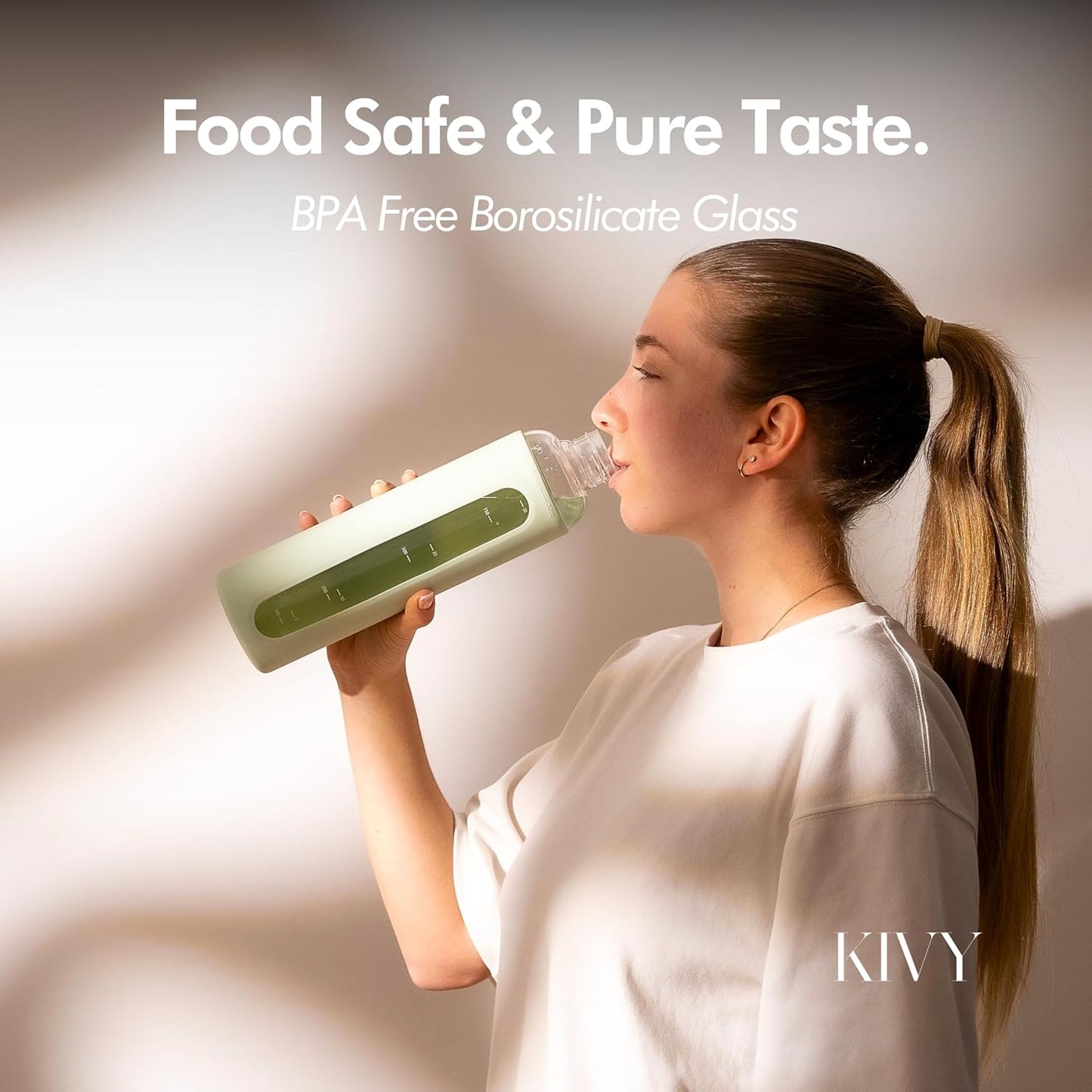 KIVY Glass Water Bottle with Silicone Sleeve 32 oz [WITH MEASUREMENT] - Borosilicate Glass Water Bottle Screw Top - Clear Bottles with Measurement Marking - Sage Green Waterbottle
